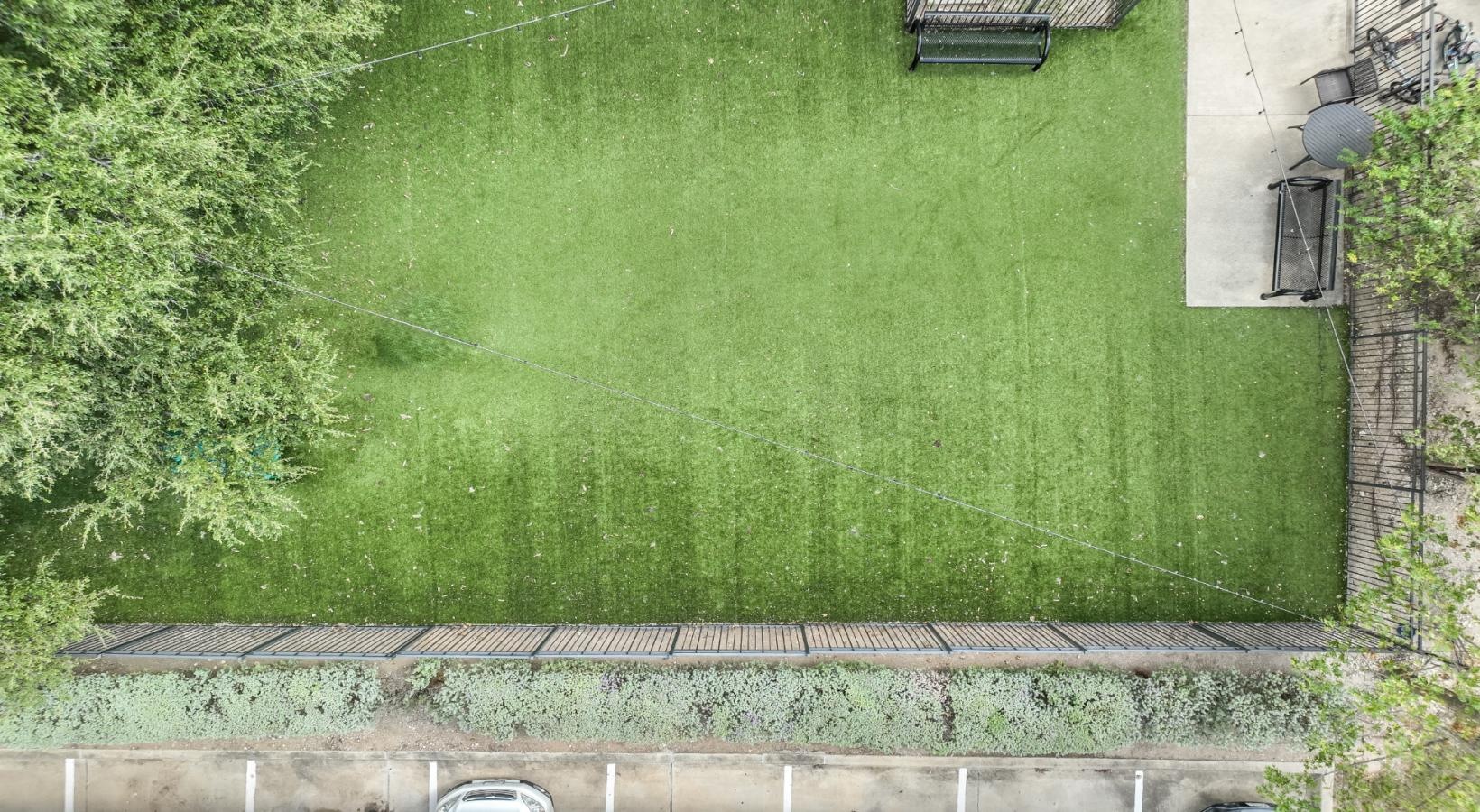 Find your perfect fit at The Allure a green lawn with a fence and trees