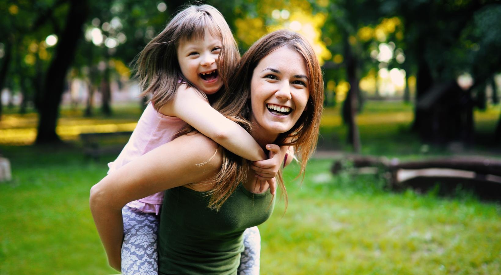 Find your perfect fit at The Allure a woman holding a child