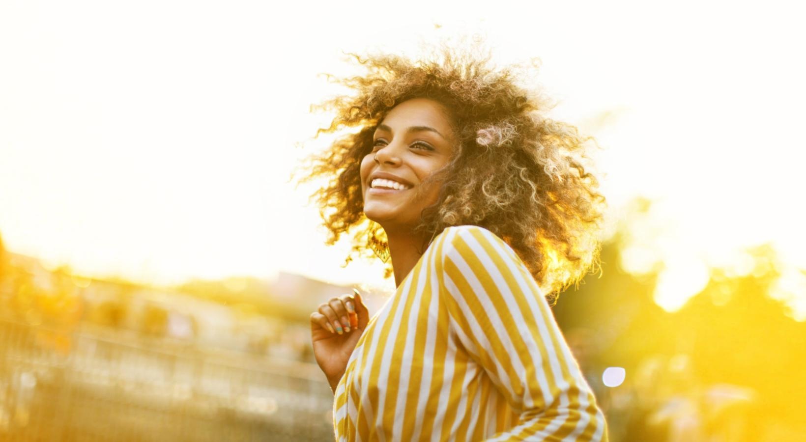 Find your perfect fit at The Allure a person with curly hair