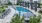 a pool with a building in the background