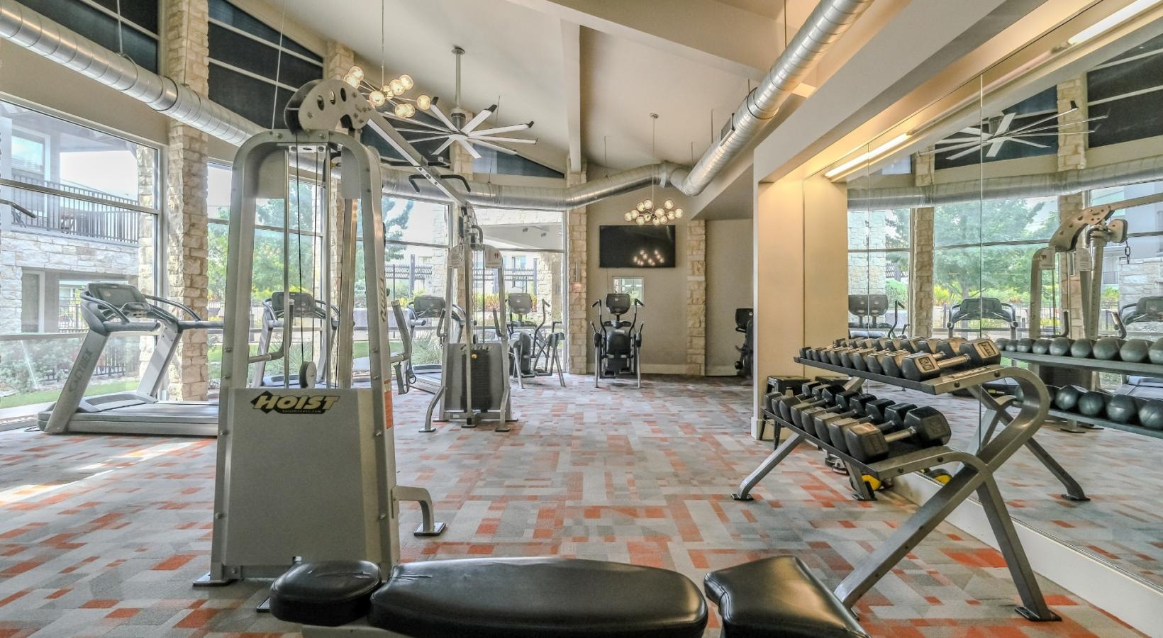 Get your workout on a gym with exercise equipment