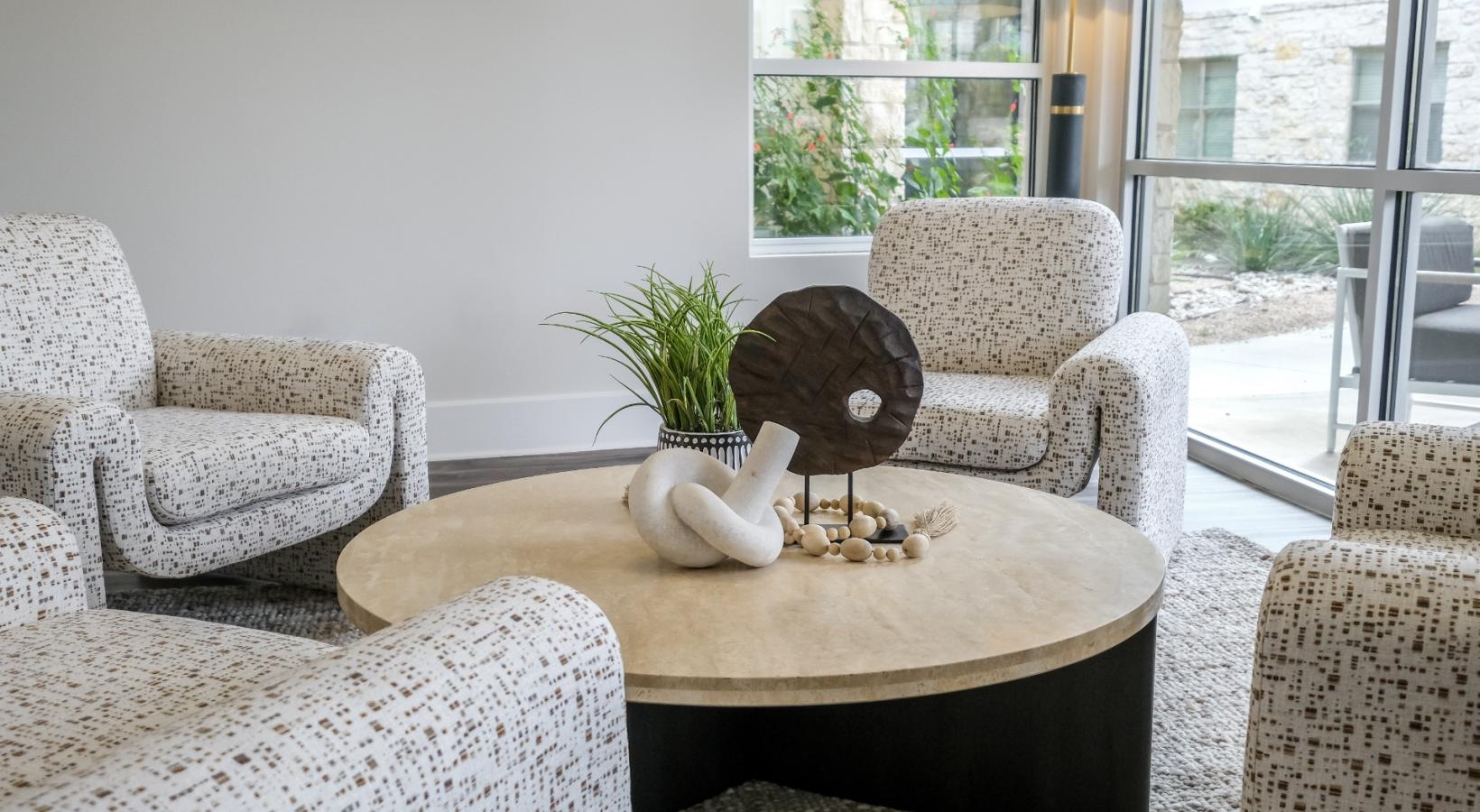 Settle into comfort at The Allure a table with chairs around it