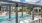 a pool with a covered patio