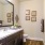 a bathroom with a large mirror