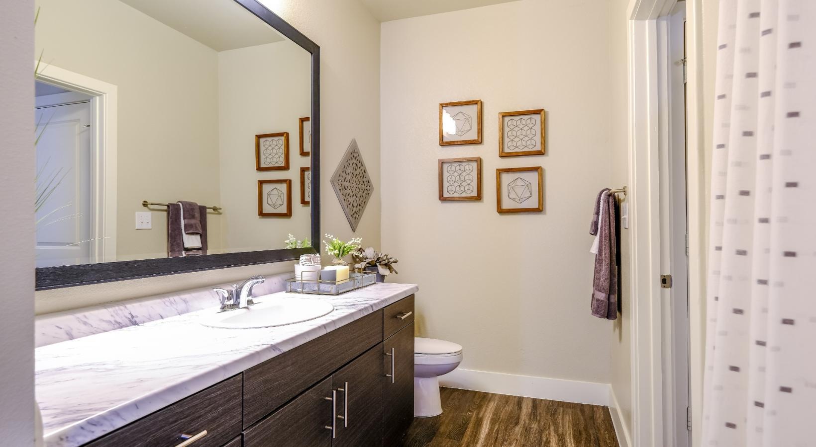 Spacious bathrooms with everything you need a bathroom with a large mirror