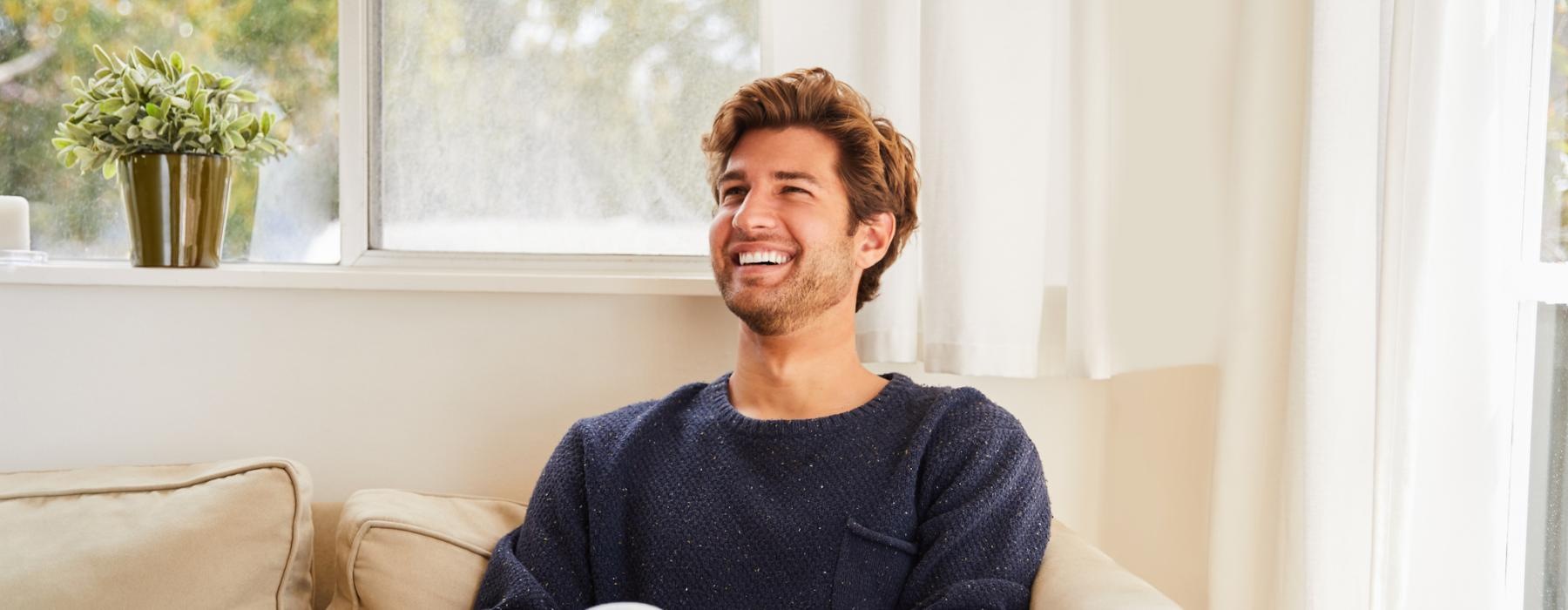 a person sitting on a couch