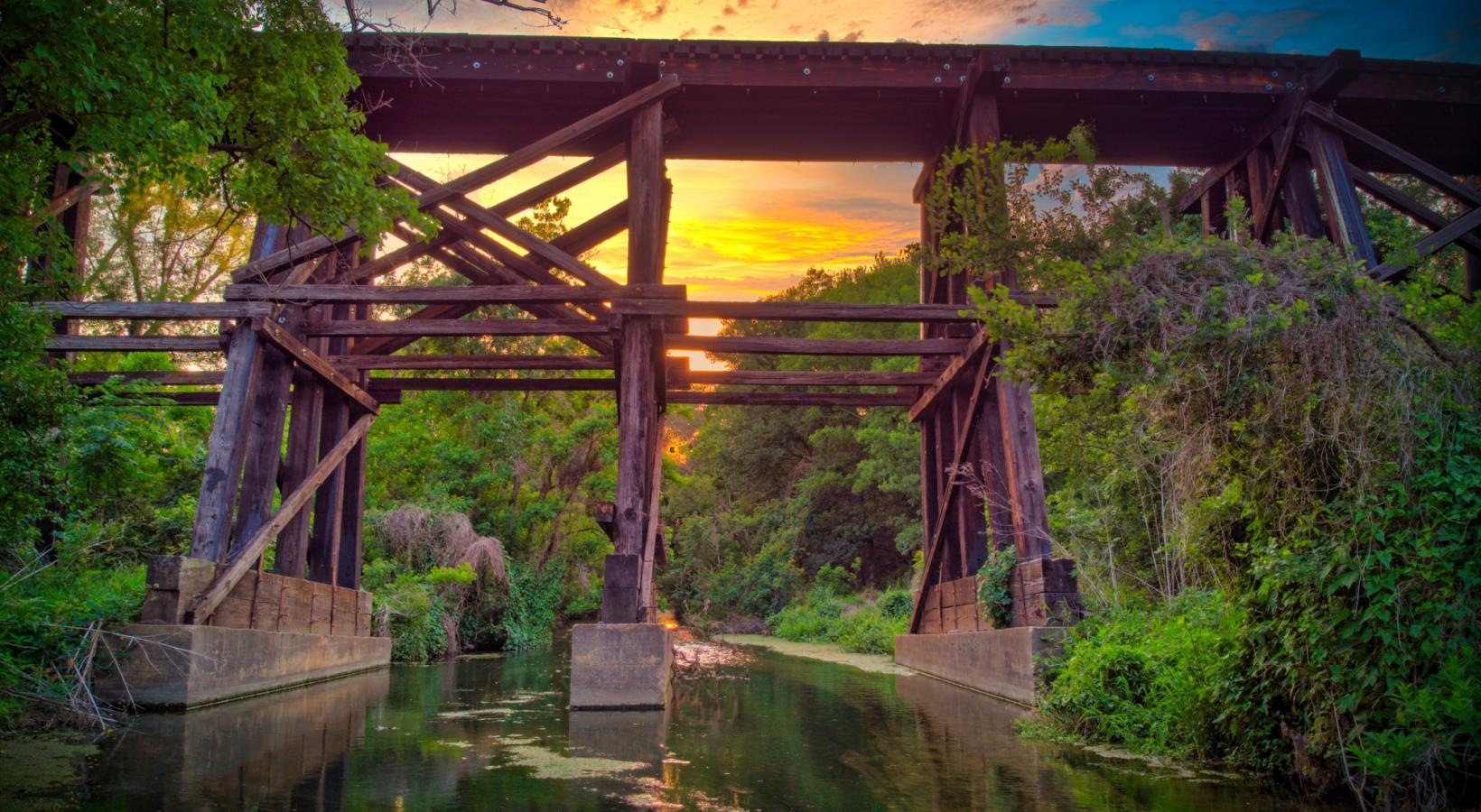 Settle into comfort at The Allure a bridge over a river